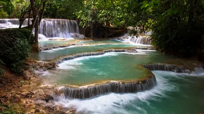 vecteezy_beautiful-waterfall-in-rain-forest-in-laos_2044966